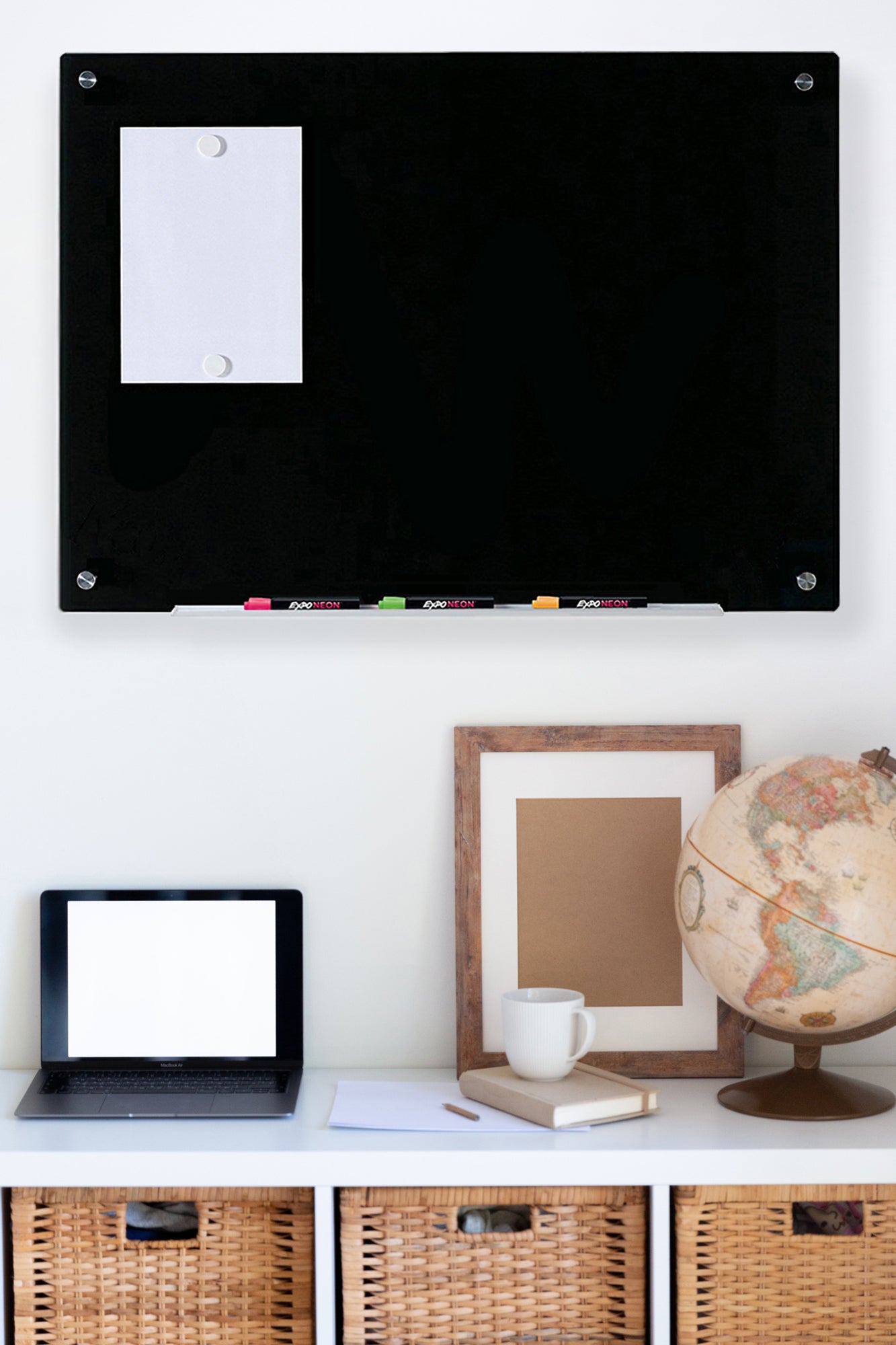 Magnetic Black Glass Dry Erase Board Chalkboard hung above a desk in a home office setting. 