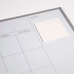Reusable Dry-Erase Sticky Pads for any non-textured surface.