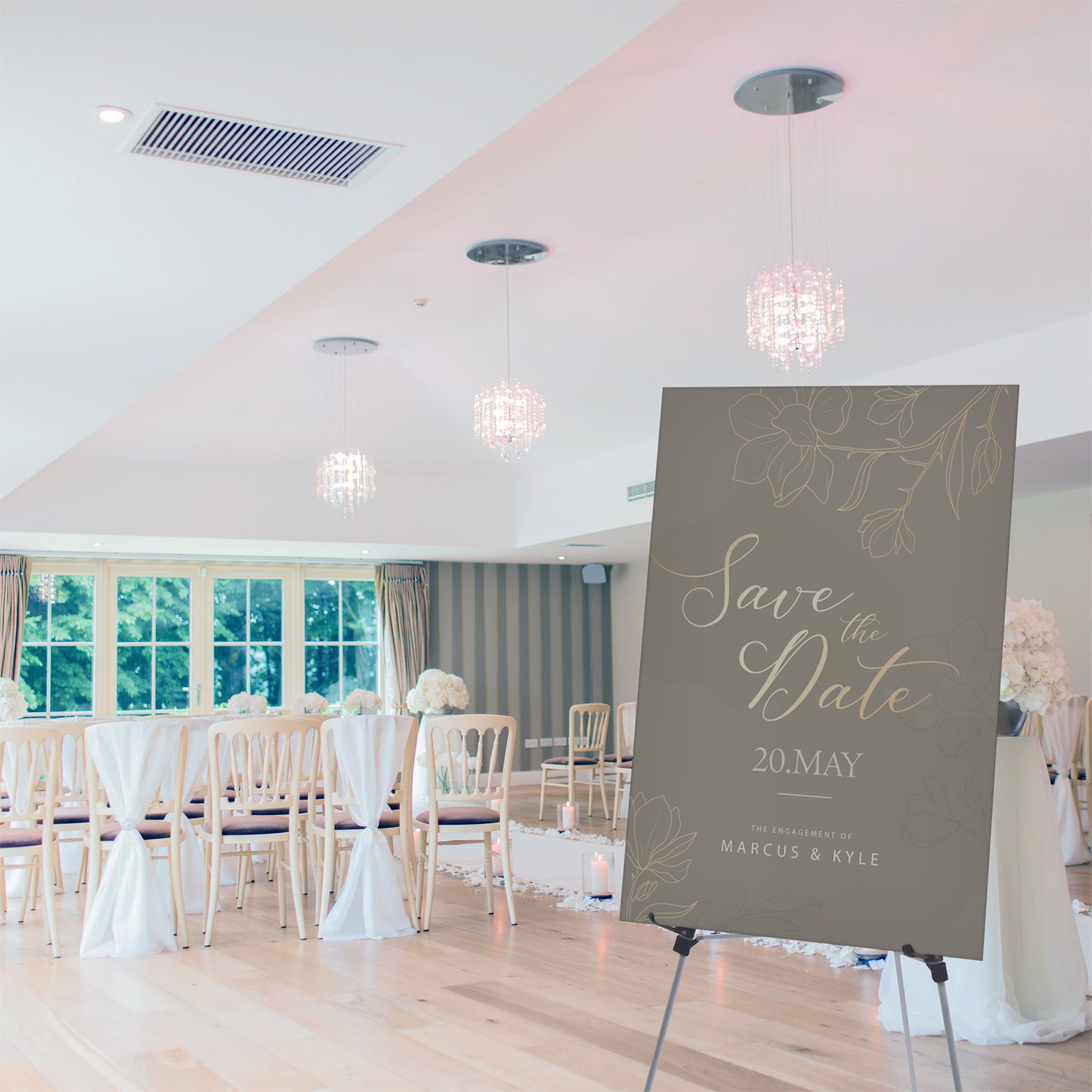 Silver Display easel at a wedding showing signage for the married couple. 