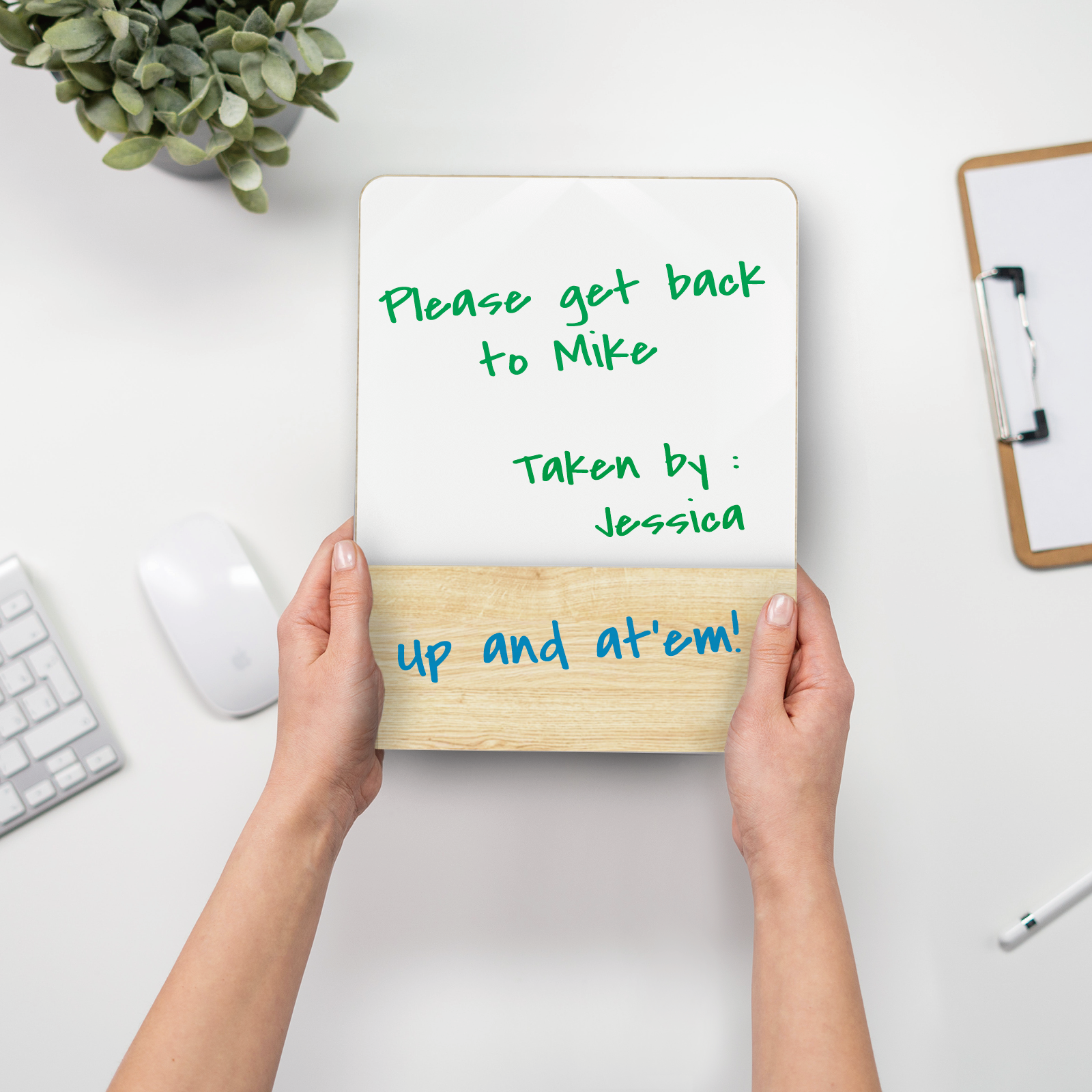 Audio-Visual Direct Wood and Glass tabletop note with a reminder to call a client. 