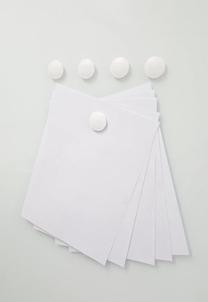 High Powered Magnets for Glass Dry-Erase Boards, Set of 5 White. Holding paper on a glass board. 