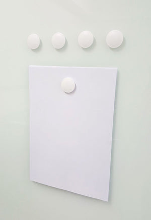 High Powered Magnets for Glass Dry-Erase Boards, Set of 5 White. Holding paper on a glass board. 