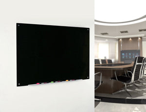 Magnetic Black Glass Dry-Erase Board Set - Includes Board, Magnets, and Marker Tray. Wall Mounted in  conference room during a presentation. 