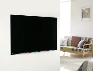 Magnetic Black Glass Dry-Erase Board Set - Includes Board, Magnets, and Marker Tray. Wall Mounted Shown In a living room 