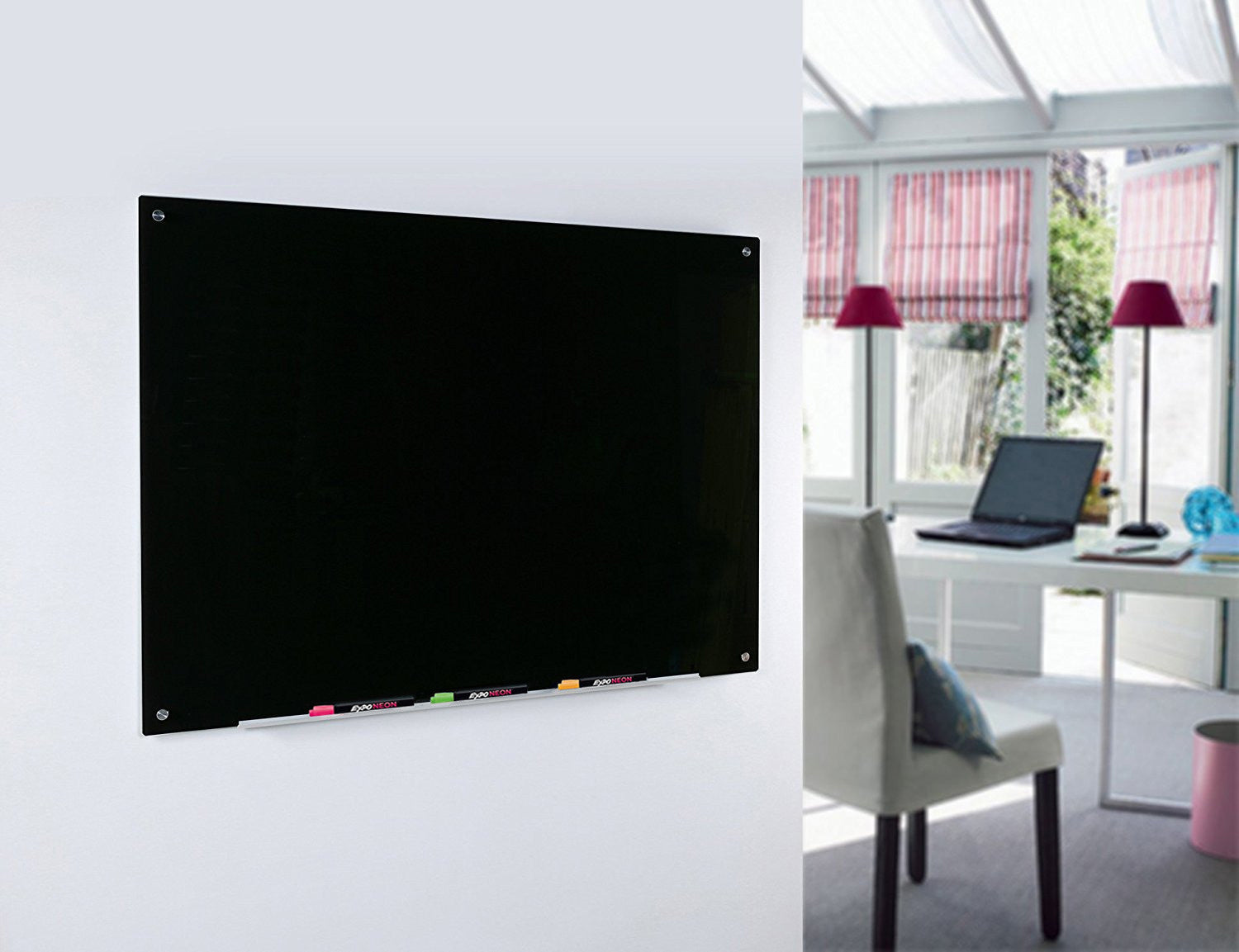 Black Glass Dry-Erase Board with Aluminum Marker Tray Mounted on Bedroom Wall. 