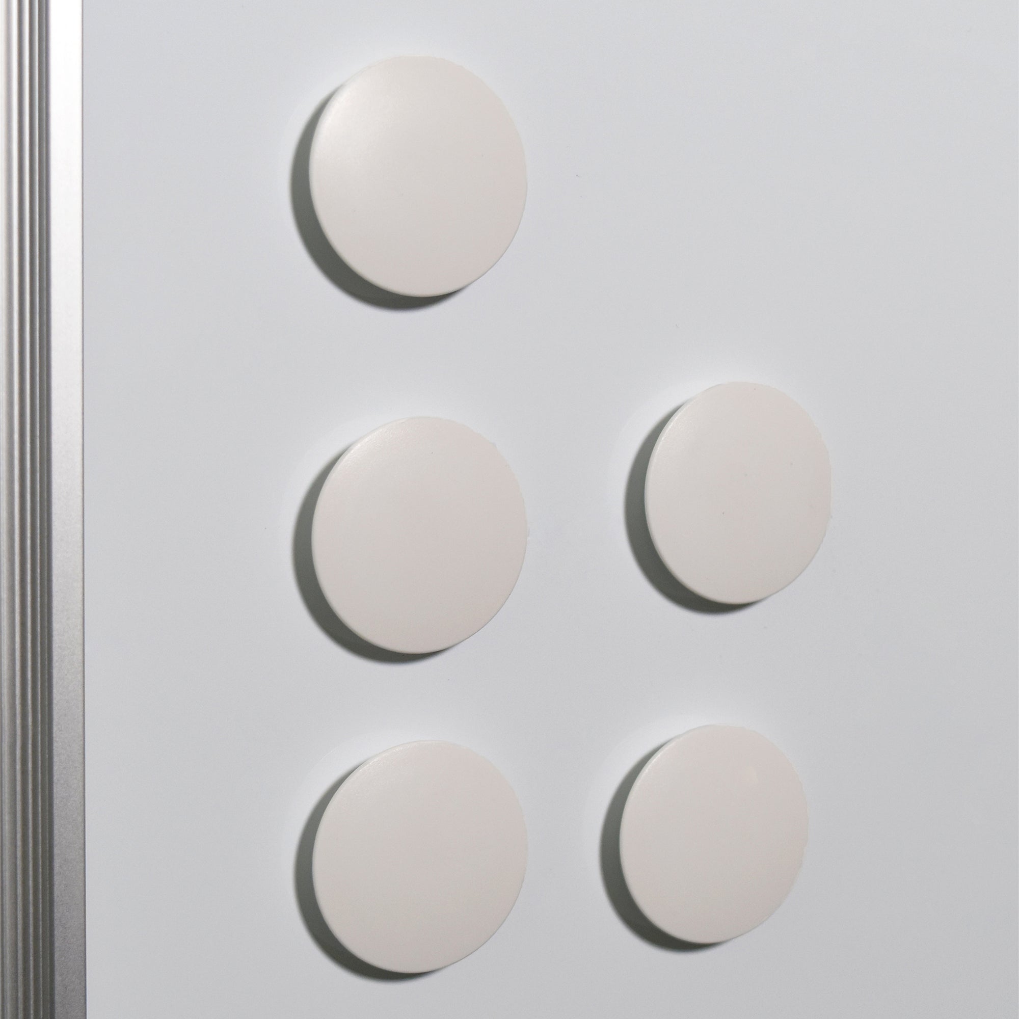 High Powered Magnets for Glass Dry-Erase Boards, Set of 5 White. Holding paper on a dry erase board. 