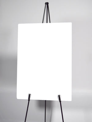 Audio-Visual Direct Black Metal Lightweight Simple Instant Easel holding a poster foam board on the adjustable art holders. 