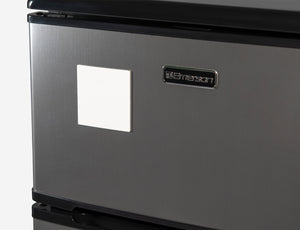 Reusable Dry-Erase Sticky Pads for any non-textured surface.. Shown on fridge. 