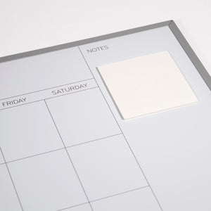 Reusable Dry-Erase Sticky Pads for any non-textured surface.