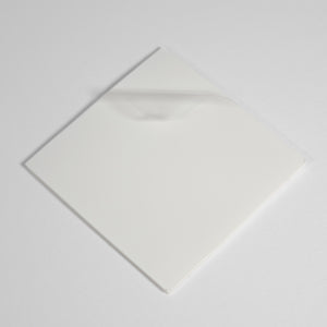 Reusable Dry-Erase Sticky Pads for any non-textured surface.